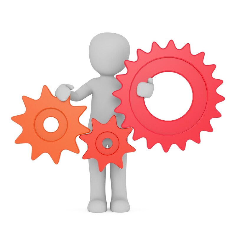 Grafik: 3-D-Männchen dreht an drei Zahnrädern.